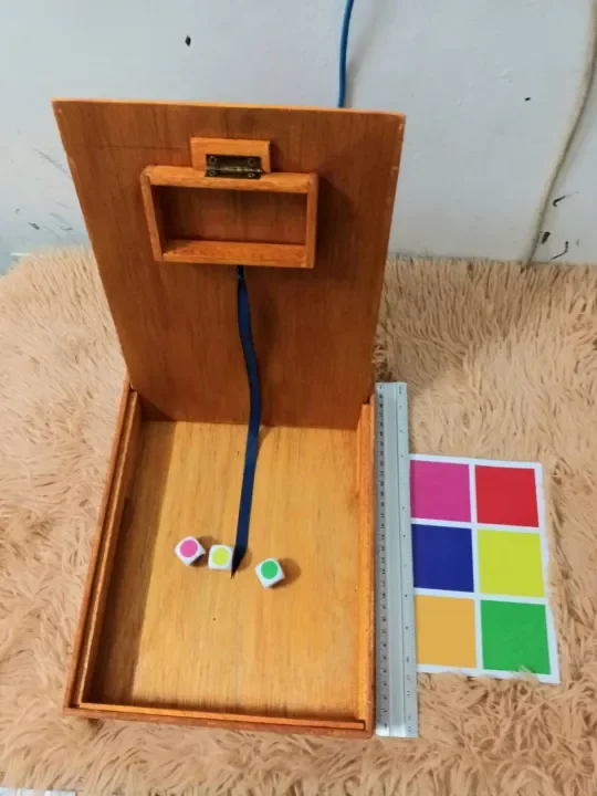 Philippine perya Color Game with three colored dice on JLJL6